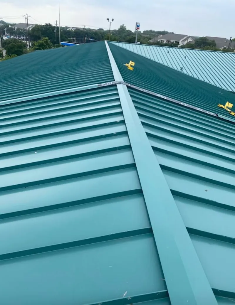 Green commercial metal roof ridge and valley for Metal Roof Repair in Harlingen