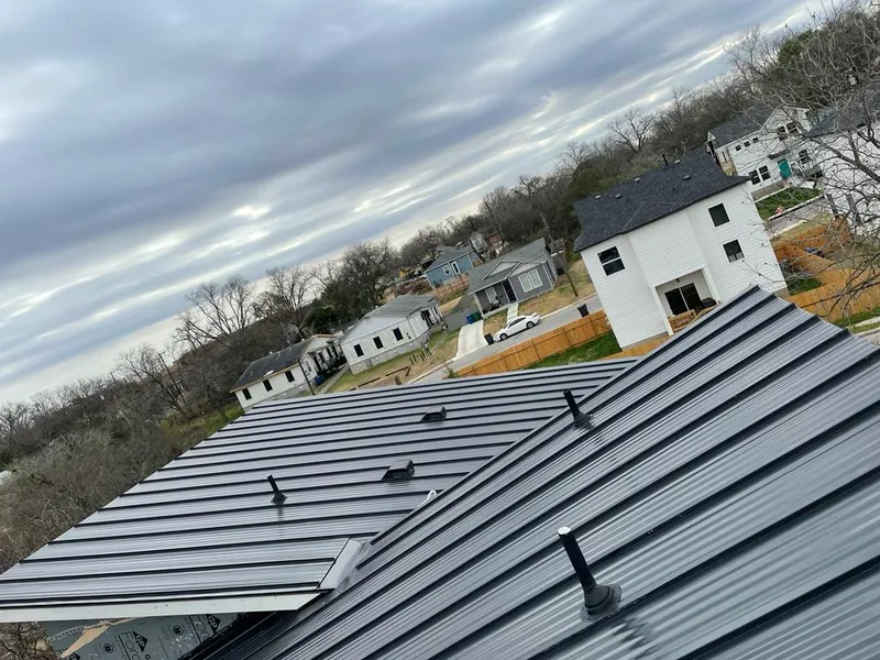 Standing seam metal roof panels with vents for Skylight Repair in Harlingen